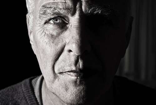 Adult man staring at camera