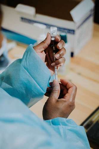 Doctor with syringe