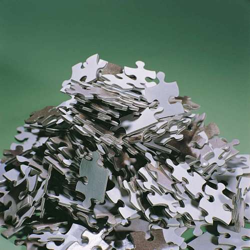 joy close-up of messy puzzle pieces