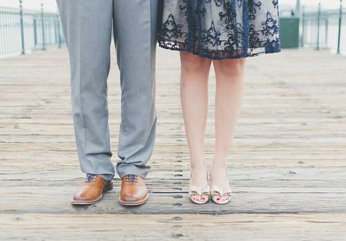 Elegant couple looking straight ahead