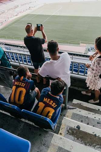pursuit People watching a soccer match in a stadium