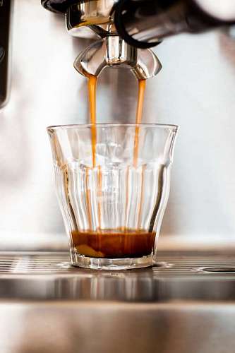 Coffee machine preparing espresso