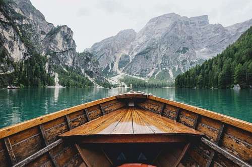 Wooden canoe sailing on a lake