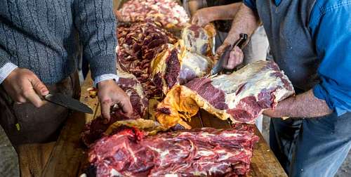 part-of  Argentine Gauchos Butchering a Beef