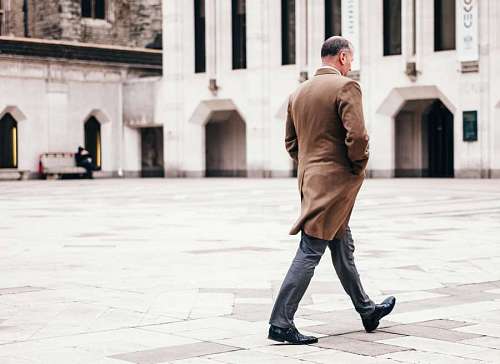 sacking Adult man walking in the city