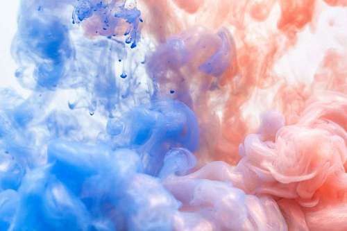 Blue and pink ink textured background