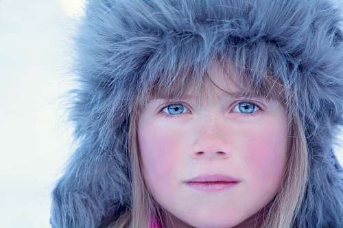 Girl with blue eyes looking at camera