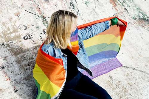 sex-symbol Young woman with LGBT flag