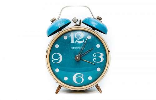 Blue alarm clock with white background