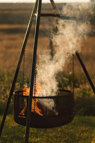 Hanging lit firepit
