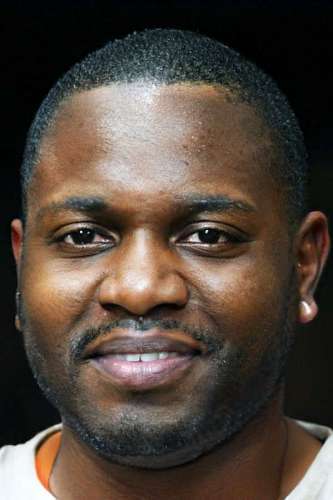 Young man looking at the camera while smiling