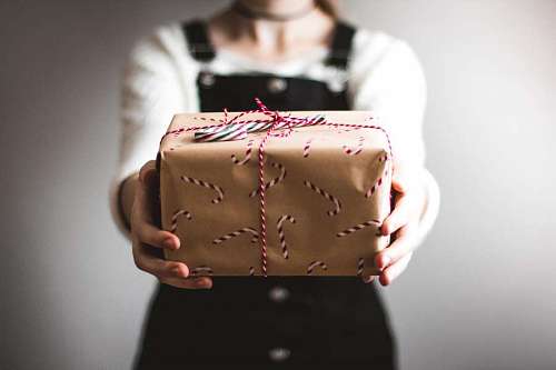 offering Woman giving christmas gift