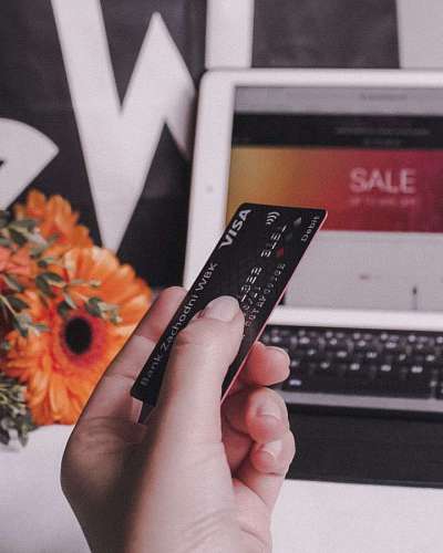 paying-in-store close-up of a hand holding a credit card