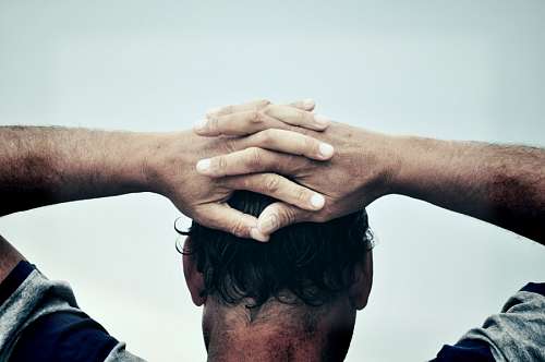 older-couple Hands on Head