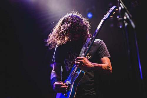 guitarist close-up on stage