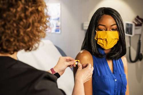 japanese Young woman receiving covid 19 vaccine