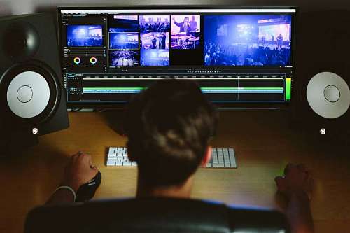 man editing videos