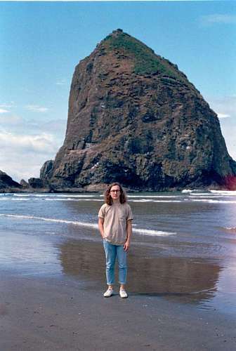 seaside Young man on the beach posing casual