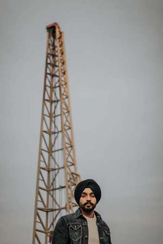 Man with turban and beard looking at the camera