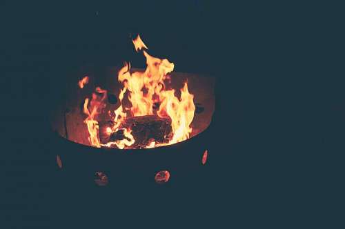 Firepit with fire lit at night