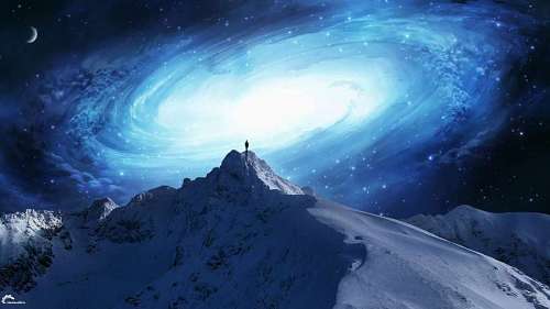 view of a silhouette standing on top of a mountain looking into space