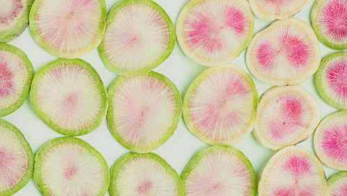 several lemon slices with each other with white studio background