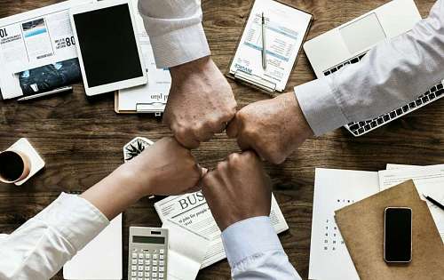 fist Teamwork concept inside the office