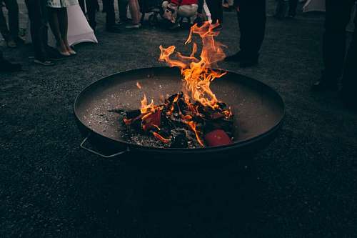 trunk Firepit with fire lit during a meeting