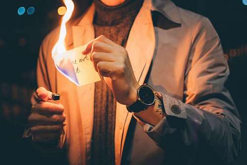 moment Man burning letter