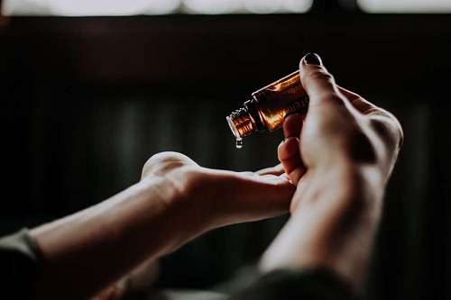 moisture Woman applying Cannabis essence