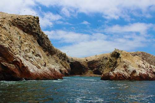 spot-lit Islas Ballestas, Paracas, Peru