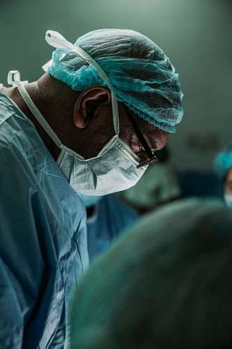 A concentrated doctor during an operation in the operating room