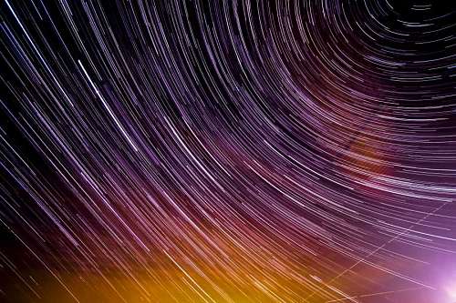 trail Background of moving stars in the night sky