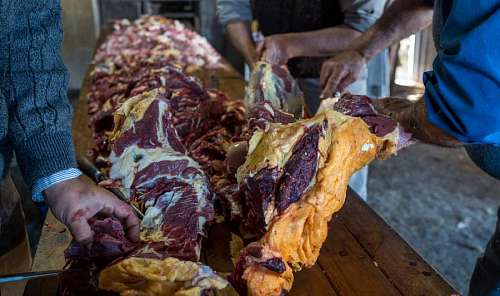 part-of  Argentine Gauchos Butchering a Beef