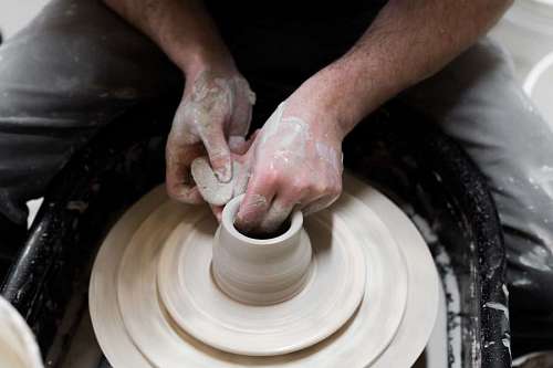 mold Man turning clay
