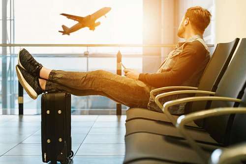 way Man waiting for his flight at the airport