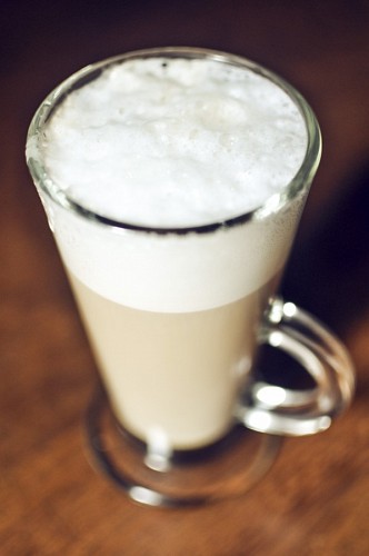 Late drink with wood background