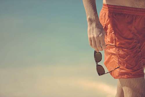 summertime Man at beach with sunglasses