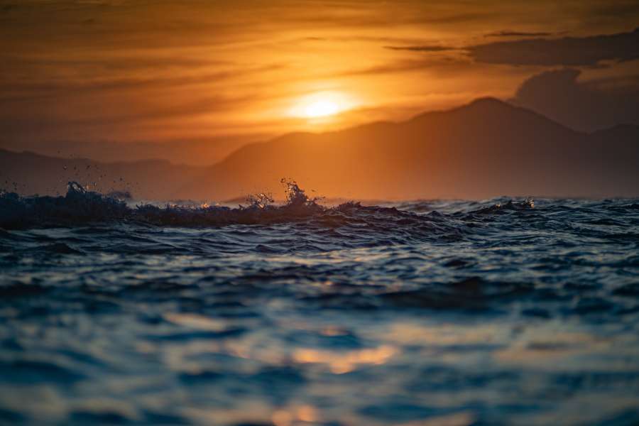 sunset, sea, coast, shore, ocean, beach, water, travel, landscape, nature, summer, vacation, background, sunrise, sky, sun, view, tropical, seascape, wave, horizon, beautiful, idyllic, blue, holiday, paradise, bay, outdoor, coastline, sunny, island, orange, colorful, relax, leisure, scenery, tourism, sunlight, seaside, exotic, transparent, sunshine, seashore, destination, resort, above, top, scene