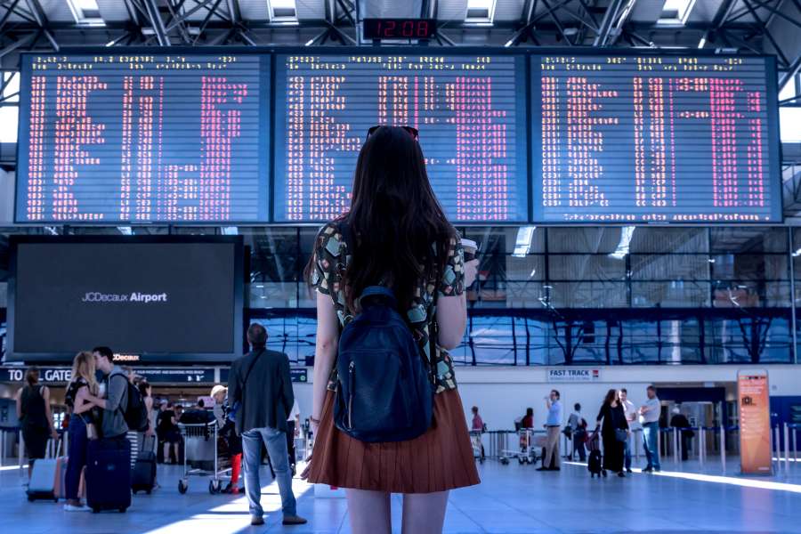 passenger, airport, travel, flight, departure, screen, woman, transportation, terminal, looking, journey, trip, traveler, airline, plane, airplane, tourist, boarding, display, person, people, girl, business, waiting, female, arrival, transport, international, young, board, tourism, information, timetable, time, gate, vacation, schedule, destination, check, modern, technology, using, background, fly, lifestyle, hand, internet, device, mobile, adult