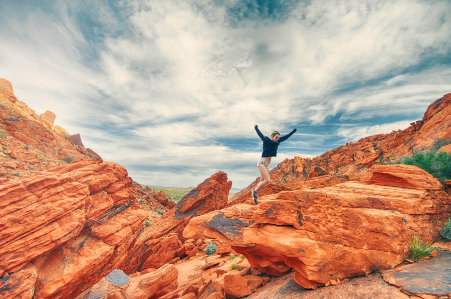 Countryside, Girl, Las Vegas, Orange, Rocks, Sky, Sport, Walking, blue, climbing, clouds, fun woman, hike, hiking, joy, jump, jumping, mountains, nature, outdoors, playful, reach, success, 