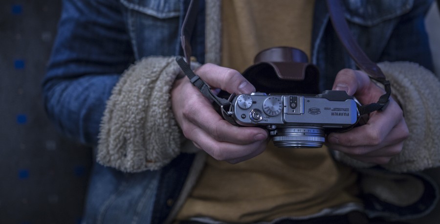 one person, people, man, camera, photography, photographer, foreground, sweater, brown, yashica lens,
