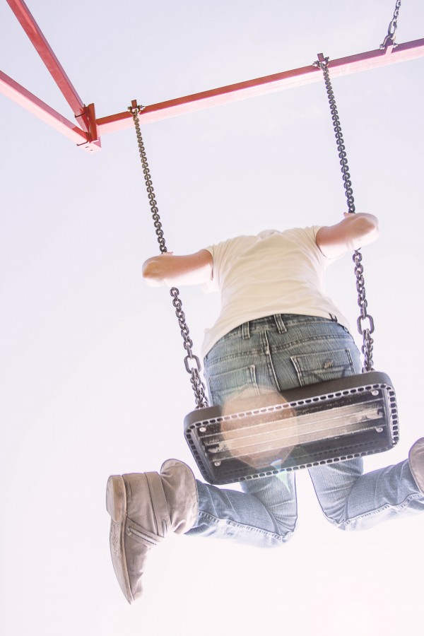 one person, people, woman, boot, boots, swing, fun, joy, summer, daytime, exterior, game, play, view below,