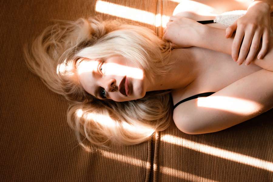 one person, content, young women, long hair, beauty, white, leisure, young adult, blonde, relaxed, vest, lifestyle, 20s, comfort, bedroom, bed, health, laying down, happy, horizontal, sleeping, pillows, underwear, resting, pajamas, vertical, fair, caucasian, pink, color image, pillow, head and shoulders, white background, front view, pho, afro, smiling, mixed race person, day dreaming, portrait, indoors, studio shot, model, 25-29 years, photography, seductive women, caucasian appearance, color mage, europe, looking at camera, beautiful woman, blond