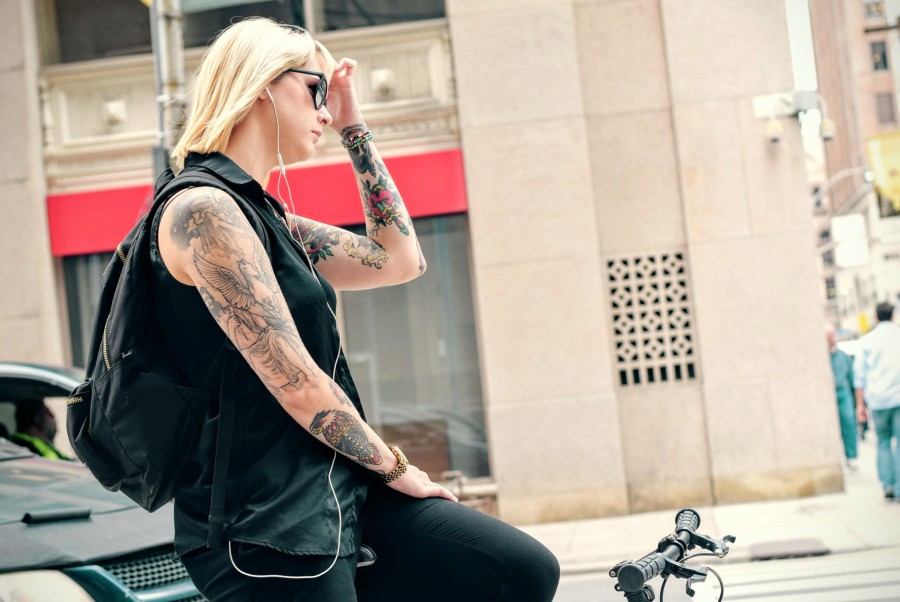 one person, people, woman, young, bicycle, urban, city, transportation, tattoo, sunglasses, goggles, blond, 20 years,