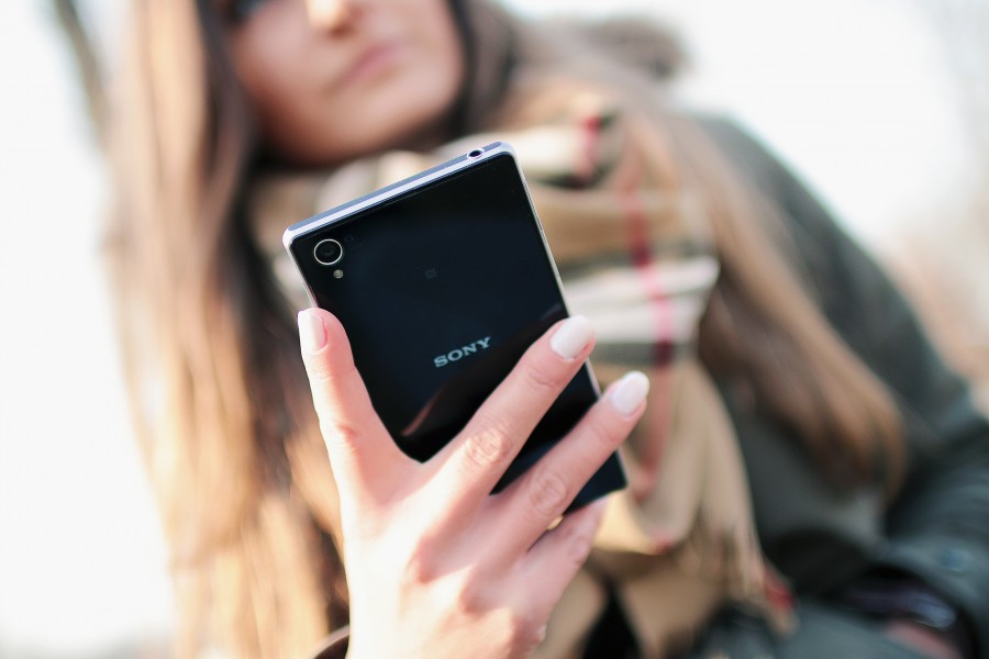 one person, people, woman, young, cell, phone, green, technology, close-up, exterior, communication, 