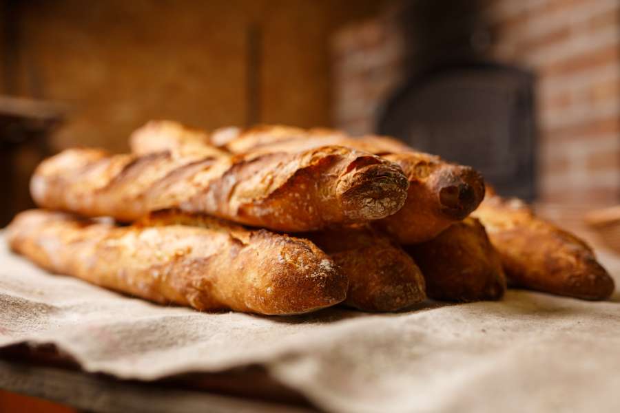 bread, food, fresh, bakery, wheat, dough, tasty, loaf, healthy, flour, brown, crust, bake, meal, bun, oven, baker, hot, nutrition, white, grain, warm, breakfast, rustic, traditional, delicious, bakehouse, work, making, homemade, crusty, background, loaf of bread, pastry, manufacturing, industry, gourmet, recently, manufacture, heat, whole wheat bread stick, ovened, workplace, baguette, machine, bread roll, mechanism, natural, wooden, french