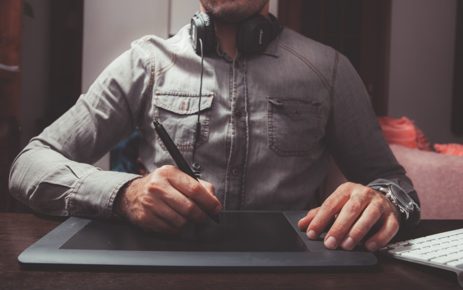 one person, people, man, tablet, technology, design, designing, fashion, pen, touch, drawing, drawing, activity, work,