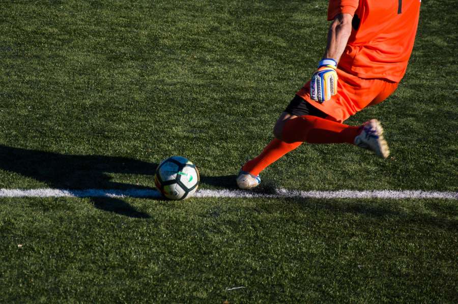 one person, player, soccer, sport, ball, action, play, line, penalty, goalkeeper, red, team, activity, outside,