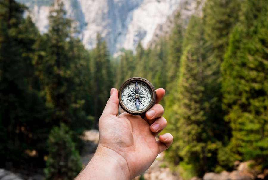 compass, forest, nature, hiking, journey, adventure, man, hiker, tourist, travel, leisure, tourism, outdoor, map, looking, traveler, navigation, person, direction, hand, lost, equipment, adult, people, discovery, recreation, explorer, way, cartography, male, exploration, orientation, plan, navigate, guide, exploring, holding, backpack, orienteering, closeup, vintage, mountain, object, concept, lifestyle, countryside, human, north, white, wrist